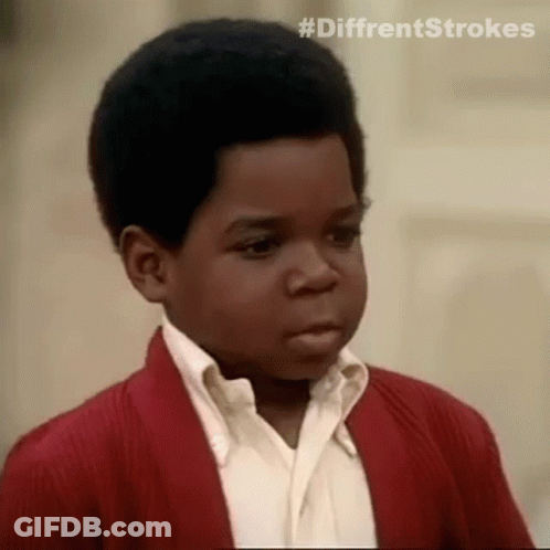 Young Black Boy In Red Sweater Making Funny Face GIF