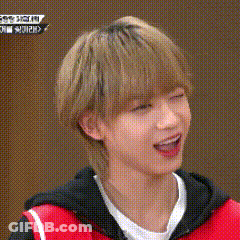 Young Blonde Man In Red Vest And Black Jacket GIF