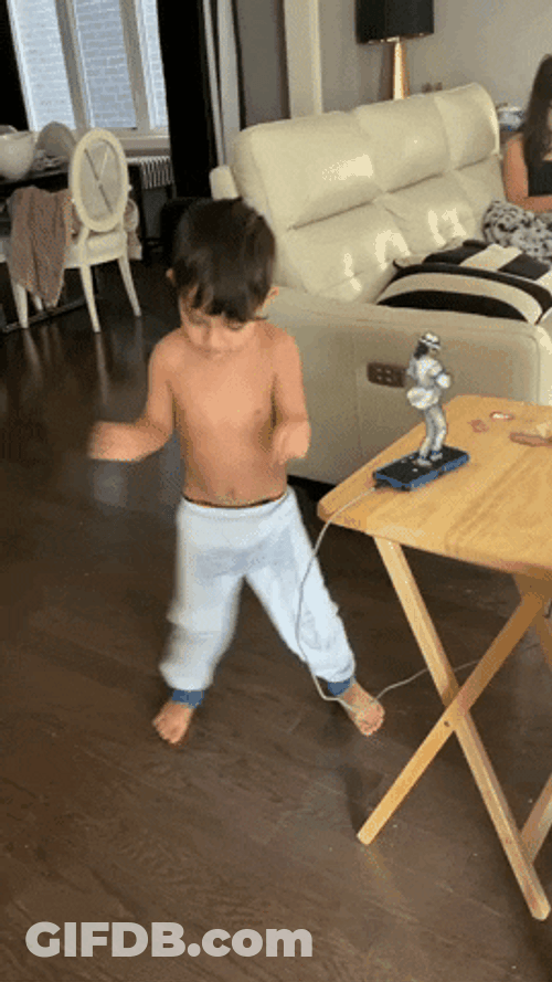 Young Boy Crazy Dancing In The Living Room GIF