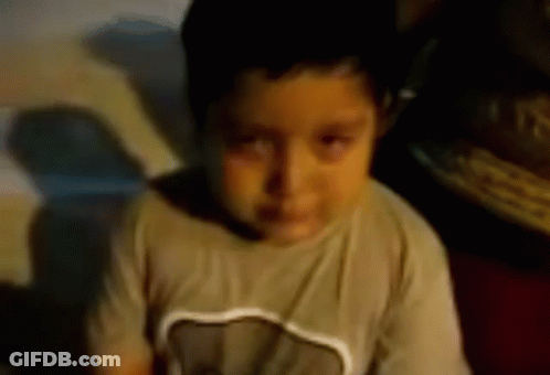 Young Boy Crying Heart T-Shirt GIF