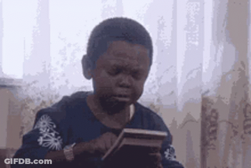Young Boy Crying Holding Cell Phone GIF