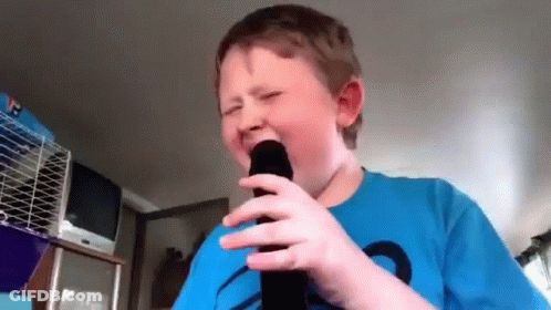 Young Boy Crying While Singing GIF