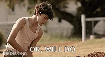 Young Boy Digging In Dirt GIF