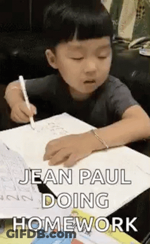 Young Boy Doing Homework With Pen GIF