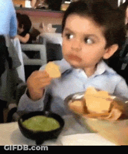 Young Boy Eating Chips GIF