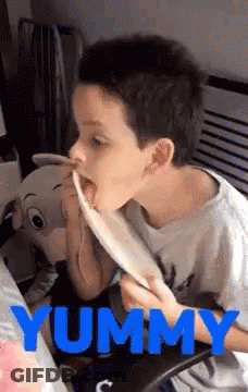 Young Boy Eating Yummy Food GIF