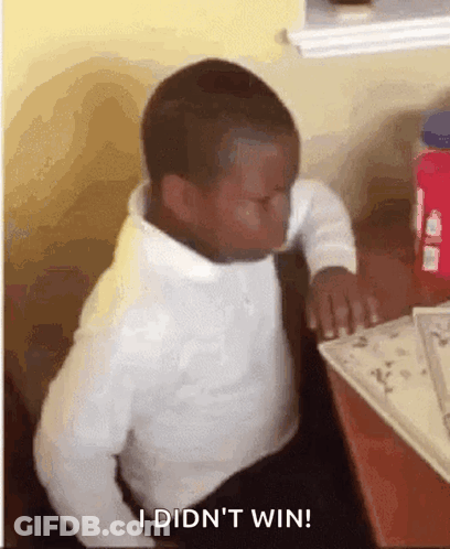 Young Boy Eyes Closed Saying I Didn't Win GIF