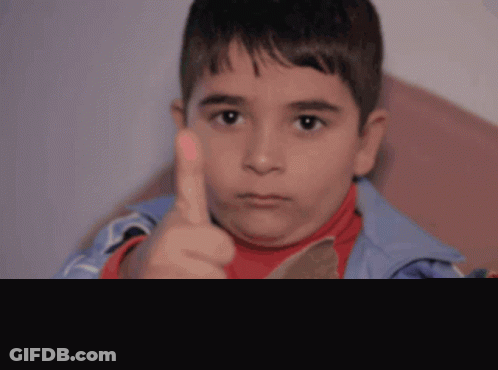 Young Boy Giving Thumbs Up GIF