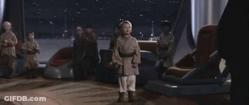 Young Boy Holding Light Saber GIF