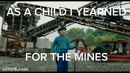 Young Boy Holding Pickaxe And Hammer At Conveyor Belt GIF