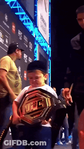 Young Boy Holding UFC Belt GIF
