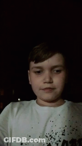 Young Boy In Army Shirt GIF