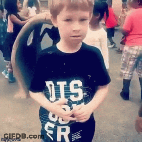 Young Boy In Black Shirt Saying DTS GIF