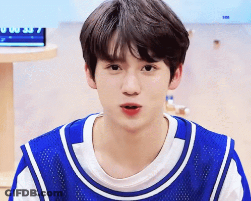 Young Boy In Blue And White Jersey Saying Sea GIF