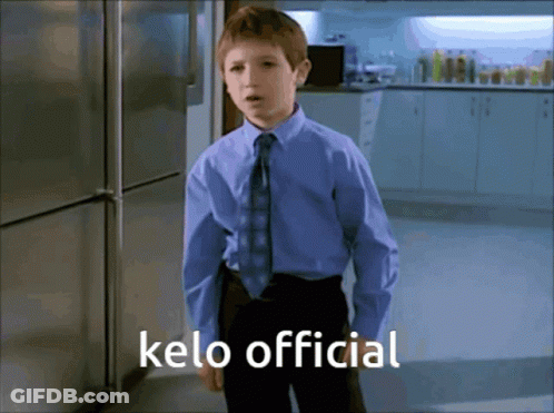 Young Boy In Blue Shirt And Tie Kelo Official GIF