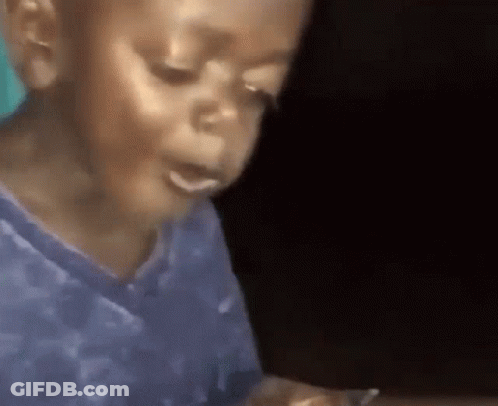 Young Boy In Blue Shirt Eating Food GIF