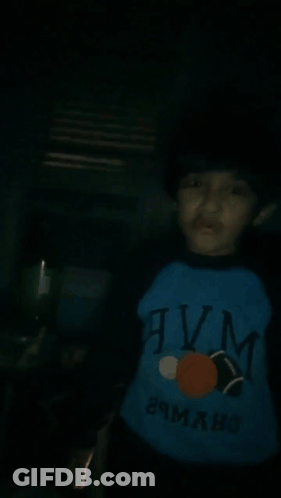 Young Boy In Blue Shirt Saying Twin Funny Face GIF