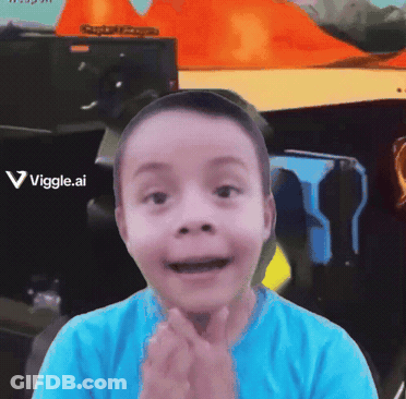 Young Boy In Blue Shirt Smiling In Front Of Viggle AI Sign GIF