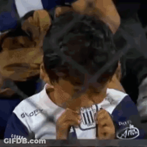 Young Boy In Blue White Shirt Eating Paper GIF