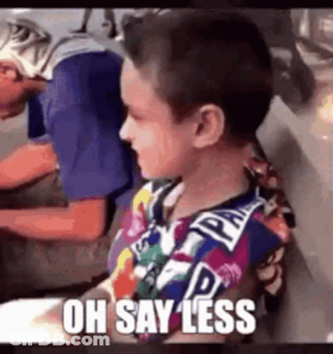 Young Boy In Colorful Shirt Says Oh Say Less Next To Man In Blue Shirt GIF