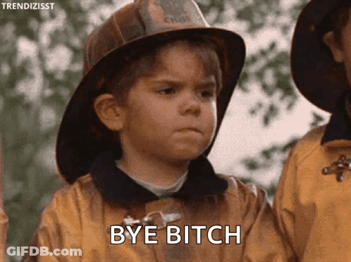 Young Boy In Fireman Hat Saying Bye GIF
