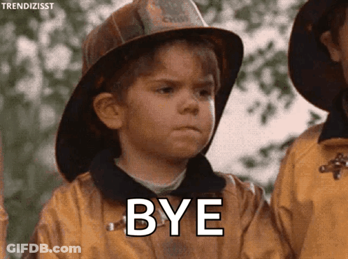 Young Boy In Fireman Helmet Saying Bye GIF