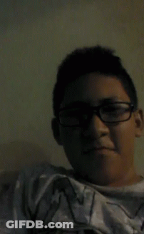 Young Boy In Glasses Wearing N Shirt GIF