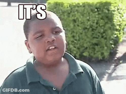 Young Boy In Green Shirt Making Funny Face Saying It's GIF