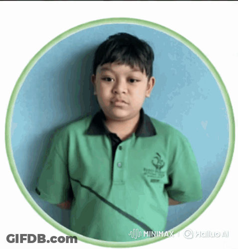 Young Boy In Green Shirt Standing In Circle GIF