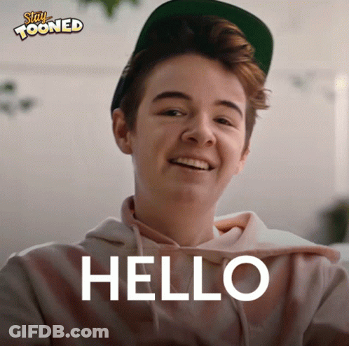 Young Boy In Hat And Hoodie Smiling Says Hello GIF