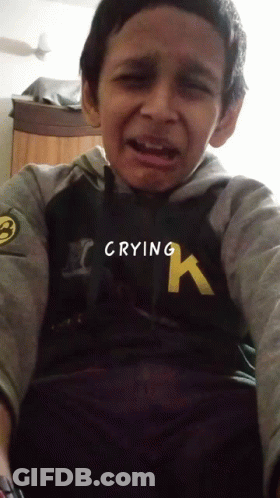 Young Boy In Hurley Sweatshirt Crying GIF