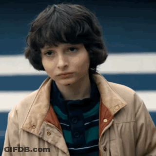 Young Boy In Jacket And Striped Shirt GIF