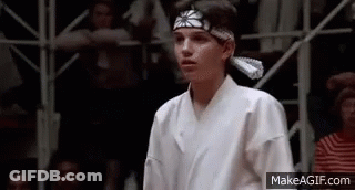 Young Boy In Karate Uniform Before Crowd GIF