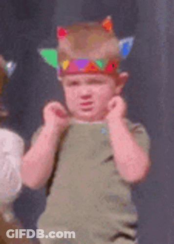 Young Boy In Native American Costume Making Funny Face GIF