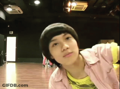 Young Boy In Pink And Yellow Shirts GIF