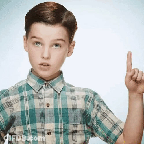 Young Boy In Plaid Shirt Pointing Up GIF