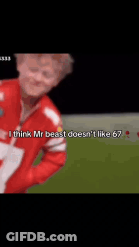 Young Boy In Red Jacket Saying Age GIF