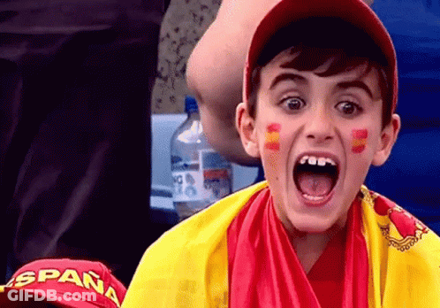 Young Boy In Spain Hat And Yellow Red Scarf GIF