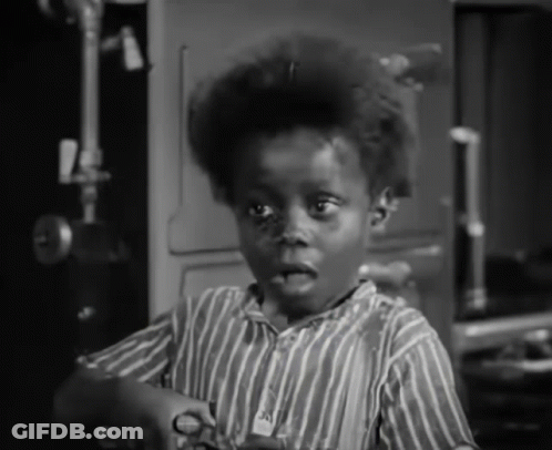 Young Boy In Striped Shirt With A GIF