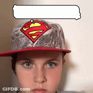 Young Boy In Superman Hat With Speech Bubble GIF
