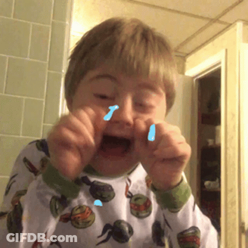 Young Boy In Teenage Mutant Ninja Turtles Pajama Shirt Crying GIF