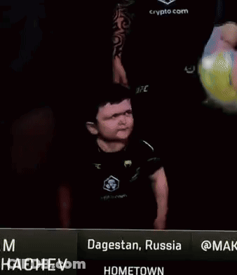 Young Boy In UFC Shirt At Dagestan Russia Hometown Sign GIF