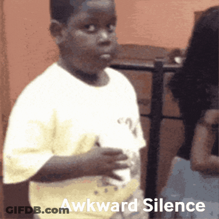 Young Boy In White Shirt Awkward Silence Sign GIF