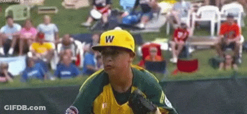 Young Boy In Yellow Hat With Letter W Playing Baseball GIF