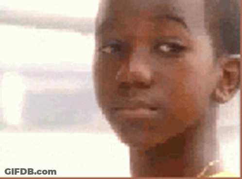 Young Boy In Yellow Shirt GIF