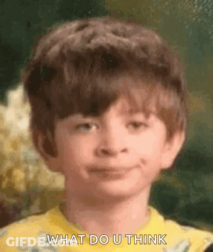 Young Boy In Yellow Shirt Smiling Making Face GIF