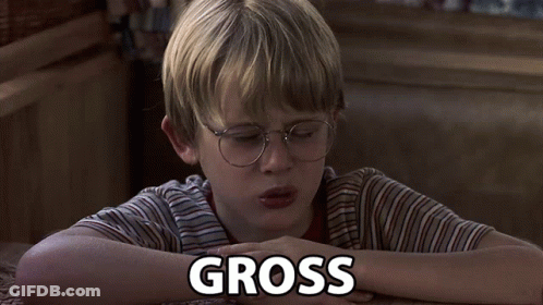 Young Boy Laying Down With Gross Above GIF