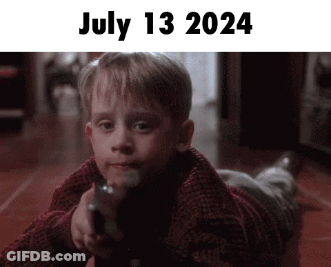 Young Boy Laying On Floor Pointing Gun July 13 2024 GIF