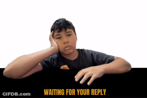 Young Boy Leaning Over Table Waiting For Your Reply GIF