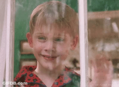 Young Boy Looking Out Window Smiling GIF